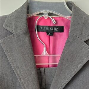 Nice great gray suite. Flat front pants and fake back pockets.